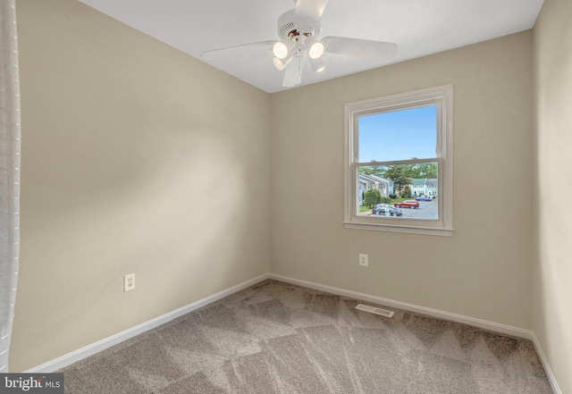 8760 Stoneridge Dr, Manassas, VA 20111 - spare room with carpet, baseboards, and a ceiling fan