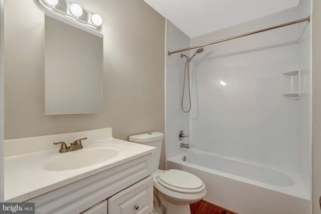 8760 Stoneridge Dr, Manassas, VA 20111 - bathroom with toilet, vanity, shower / bath combination, and wood finished floors
