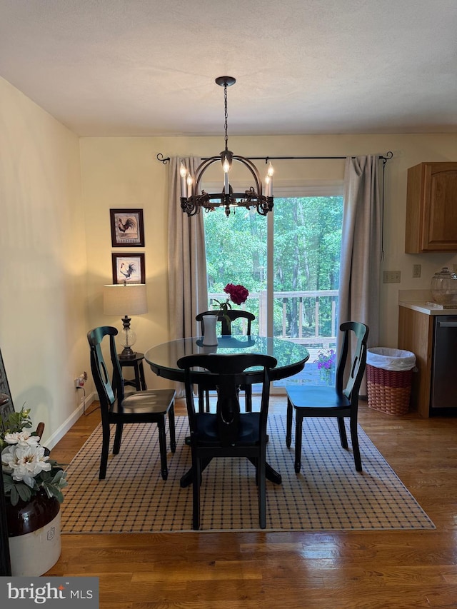 55 Ithica Ln, High View, WV 26808 - dining space with a chandelier, wood finished floors, and baseboards