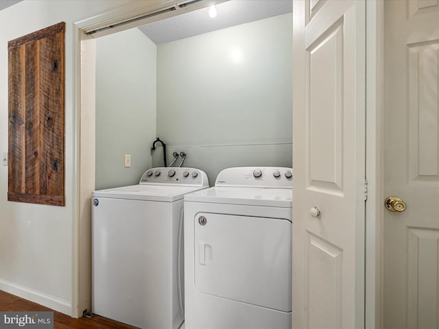 55 Ithica Ln, High View, WV 26808 - laundry room featuring separate washer and dryer and wood finished floors