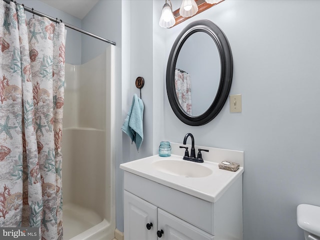 55 Ithica Ln, High View, WV 26808 - full bathroom featuring vanity, a shower with shower curtain, and toilet