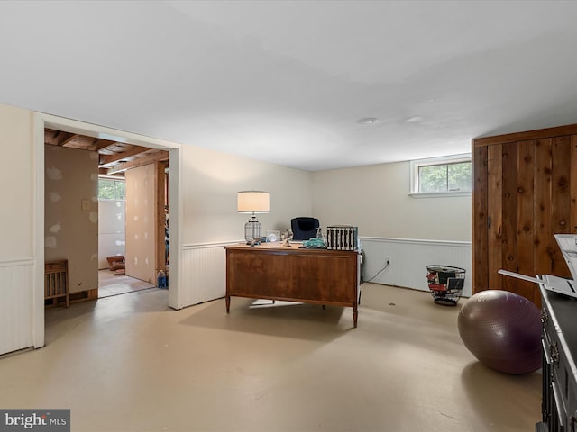 55 Ithica Ln, High View, WV 26808 - office area with concrete floors and a wainscoted wall