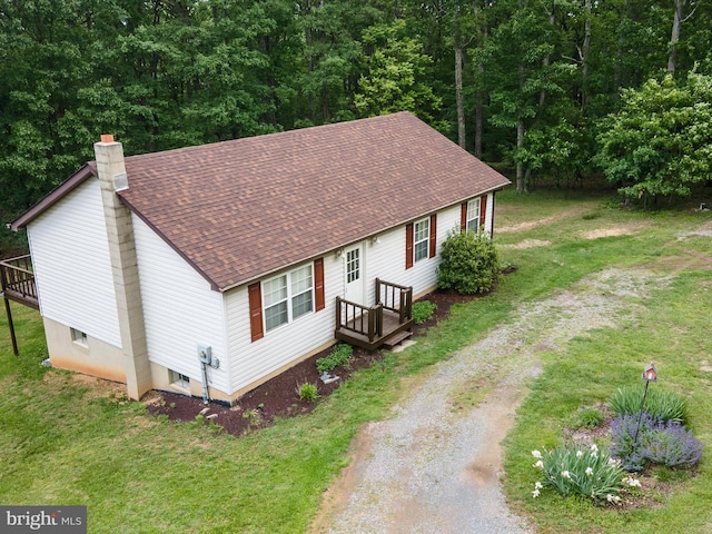 55 Ithica Ln, High View, WV 26808 - view of front of property with a chimney, driveway, roof with shingles, and a front yard