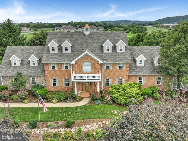 419 Coffee Goss Rd, Marietta, PA 17547 - colonial inspired home featuring brick siding, a front yard, and a shingled roof