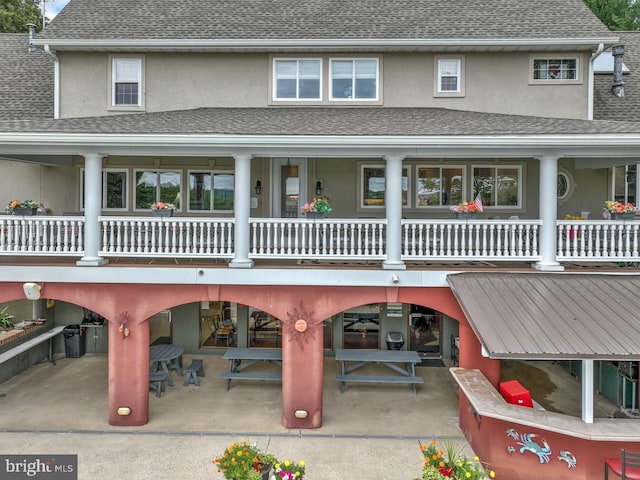 419 Coffee Goss Rd, Marietta, PA 17547 - rear view of house with stucco siding, a patio area, and a shingled roof
