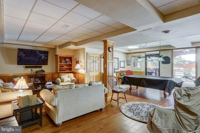 419 Coffee Goss Rd, Marietta, PA 17547 - living area with billiards, hardwood / wood-style flooring, wainscoting, and a drop ceiling