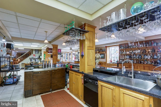 419 Coffee Goss Rd, Marietta, PA 17547 - bar featuring a drop ceiling, dishwasher, a sink, and light tile patterned flooring