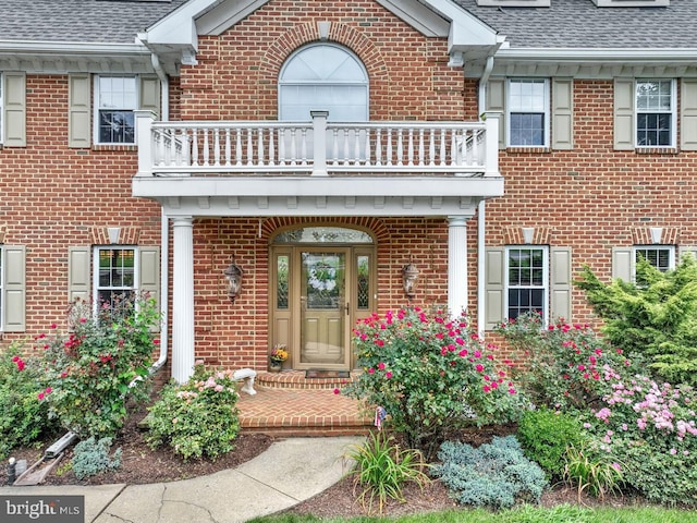 419 Coffee Goss Rd, Marietta, PA 17547 - property entrance with a balcony, brick siding, and a shingled roof