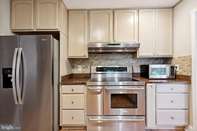 810 Sugarland Run Dr, Sterling, VA 20164 - kitchen featuring stainless steel appliances, dark countertops, ventilation hood, cream cabinets, and backsplash