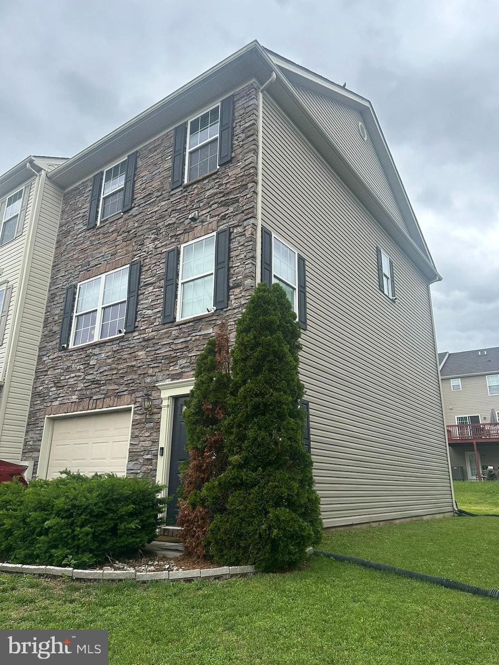 224 Morlatt Ln, Martinsburg, WV 25404 - view of side of property with stone siding and a lawn