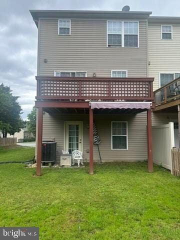 224 Morlatt Ln, Martinsburg, WV 25404 - back of property with a lawn, a wooden deck, and central AC unit