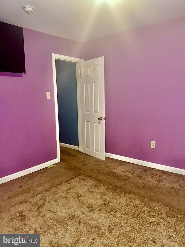 117 N Dupont St, Wilmington, DE 19805 - carpeted spare room featuring baseboards