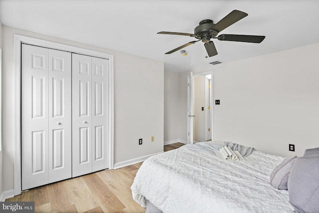 31 S Ann St, Baltimore, MD 21231 - bedroom featuring light wood-style flooring, baseboards, a closet, and a ceiling fan