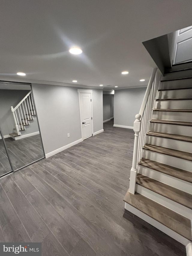 1712 W 65th Ave, Philadelphia, PA 19126 - finished basement with stairs, baseboards, wood finished floors, and recessed lighting