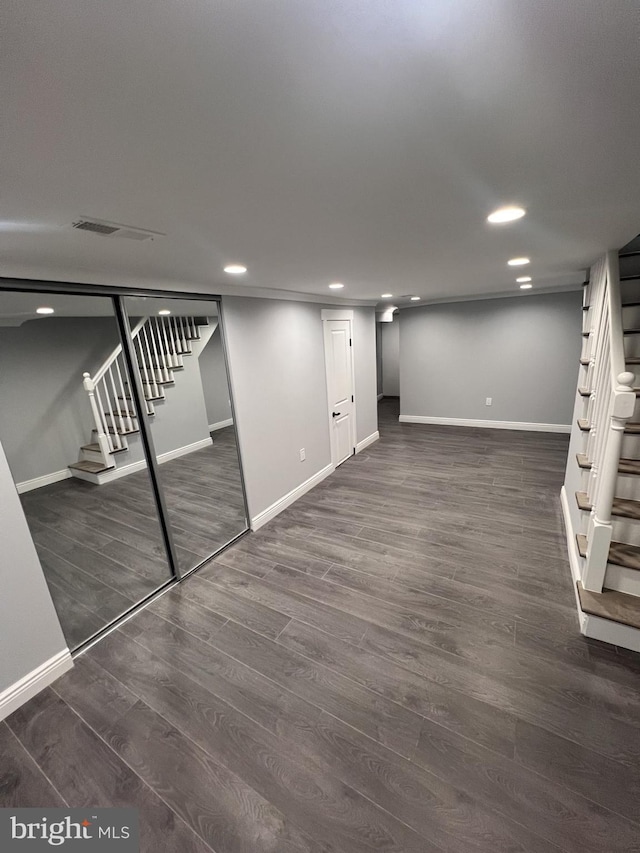 1712 W 65th Ave, Philadelphia, PA 19126 - finished basement with stairs, baseboards, dark wood-style floors, and recessed lighting