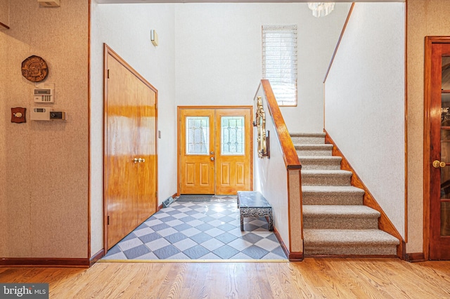 437 S 8th S, Galloway, NJ 08205 - entryway with wood finished floors, stairway, baseboards, and a high ceiling