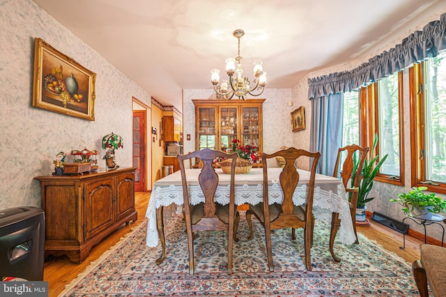 437 S 8th S, Galloway, NJ 08205 - dining room with wallpapered walls, a chandelier, and light wood-style flooring