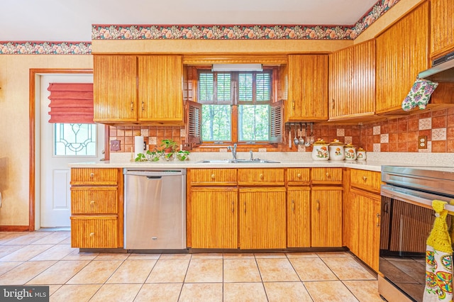 437 S 8th S, Galloway, NJ 08205 - kitchen with dishwasher, a sink, stove, light countertops, and plenty of natural light