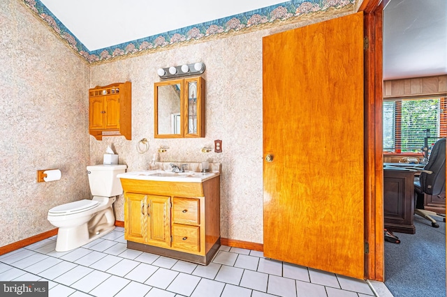 437 S 8th S, Galloway, NJ 08205 - bathroom featuring vanity, tile patterned flooring, toilet, wallpapered walls, and baseboards