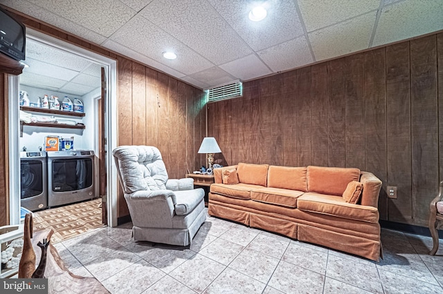 437 S 8th S, Galloway, NJ 08205 - living area featuring washer and clothes dryer, wood walls, a drop ceiling, and recessed lighting