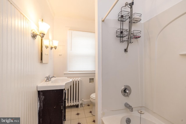 22 E 6th St, Pottstown, PA 19464 - full bathroom with radiator heating unit, vanity, tile patterned floors, toilet, and shower / tub combination