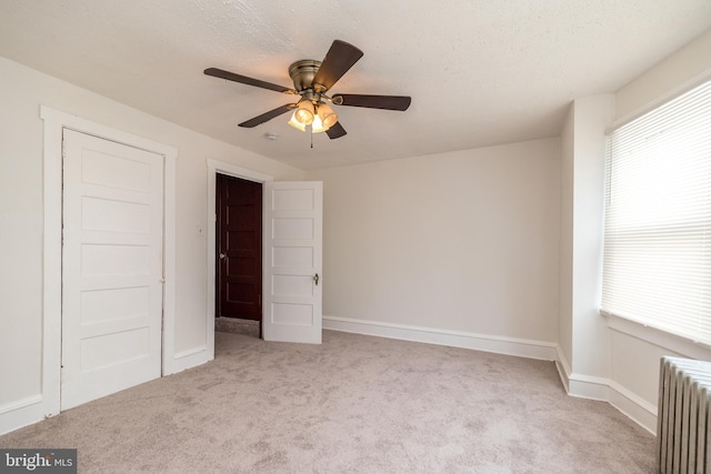 22 E 6th St, Pottstown, PA 19464 - unfurnished bedroom featuring radiator heating unit, carpet flooring, and baseboards