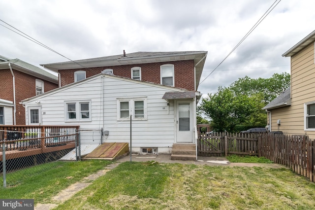 22 E 6th St, Pottstown, PA 19464 - rear view of house featuring entry steps, a wooden deck, and brick siding