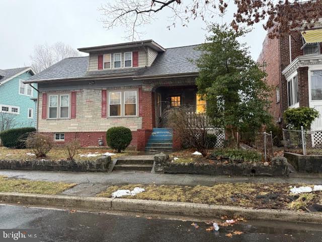 820 Whittier Pl NW, Washington, DC 20012 - bungalow with a shingled roof and a porch