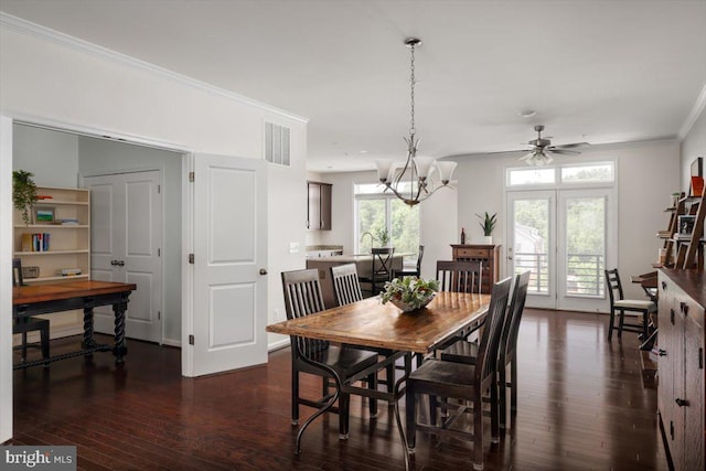 1318 Ribbon Limestone Ter SE, Leesburg, VA 20175 - dining room featuring dark wood-type flooring, crown molding, healthy amount of natural light, a ceiling fan, and a chandelier