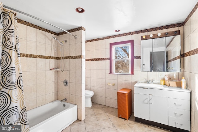 2348 N Mascher St, Philadelphia, PA 19133 - full bathroom featuring tile walls, shower / bathtub combination with curtain, vanity, toilet, and tile patterned flooring