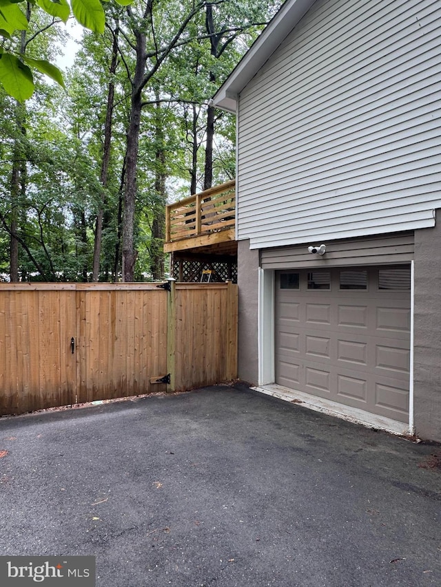 131 Oakwood Dr, Stafford, VA 22554 - garage with asphalt driveway