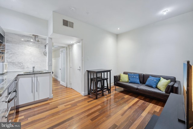 2213 S St Unit 1, Philadelphia, PA 19146 - living area with light wood-style flooring and recessed lighting