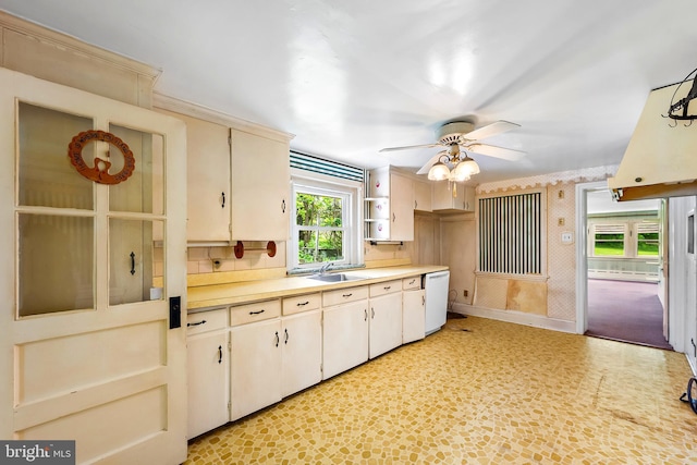 3577 Olde Bedminster Rd, Ottsville, PA 18942 - kitchen featuring white dishwasher, a sink, light countertops, ceiling fan, and baseboards