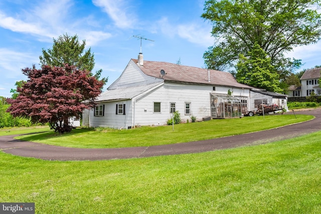 3577 Olde Bedminster Rd, Ottsville, PA 18942 - view of property exterior with a lawn and a chimney