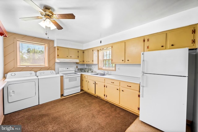 3577 Olde Bedminster Rd, Ottsville, PA 18942 - kitchen featuring white appliances, independent washer and dryer, a sink, under cabinet range hood, and light countertops
