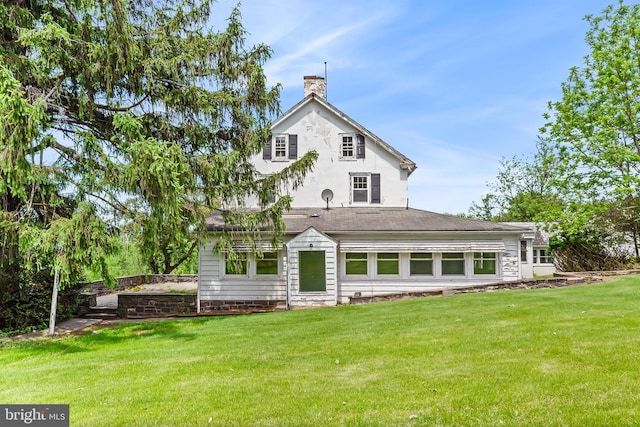 3577 Olde Bedminster Rd, Ottsville, PA 18942 - back of house with a chimney and a lawn