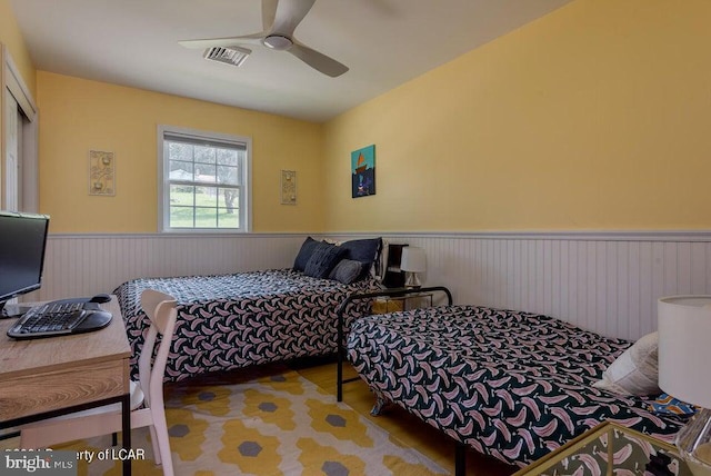 279 Apache Dr, Shickshinny, PA 18655 - bedroom with a wainscoted wall and ceiling fan