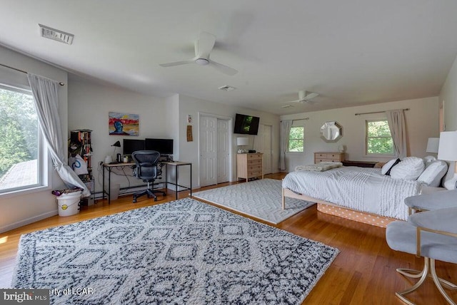 279 Apache Dr, Shickshinny, PA 18655 - bedroom with a desk, wood finished floors, and ceiling fan