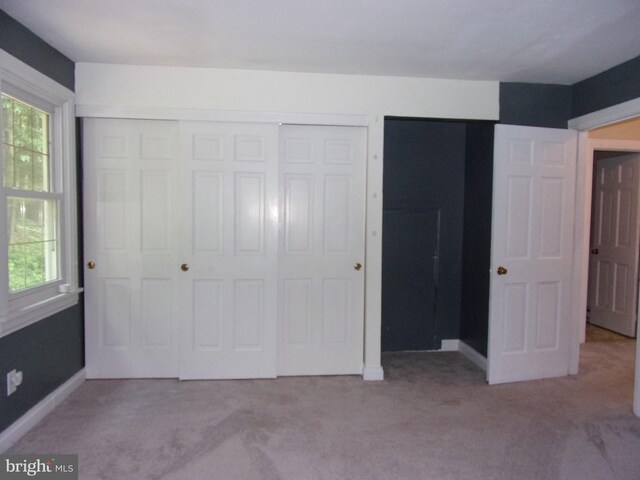 142 Fawn Rd, Reedsville, PA 17084 - unfurnished bedroom with carpet, baseboards, and a closet