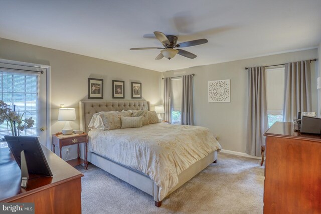 7857 Holly Branch Dr, Laurel, DE 19956 - bedroom featuring light carpet, a ceiling fan, and baseboards