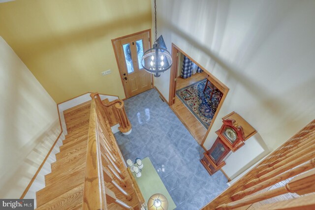 7857 Holly Branch Dr, Laurel, DE 19956 - stairway with baseboards and a chandelier