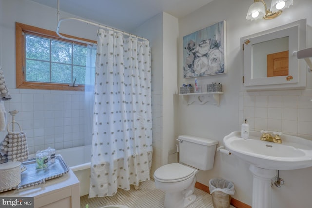 7857 Holly Branch Dr, Laurel, DE 19956 - full bathroom featuring toilet, tile patterned floors, shower / bath combination with curtain, backsplash, and a sink