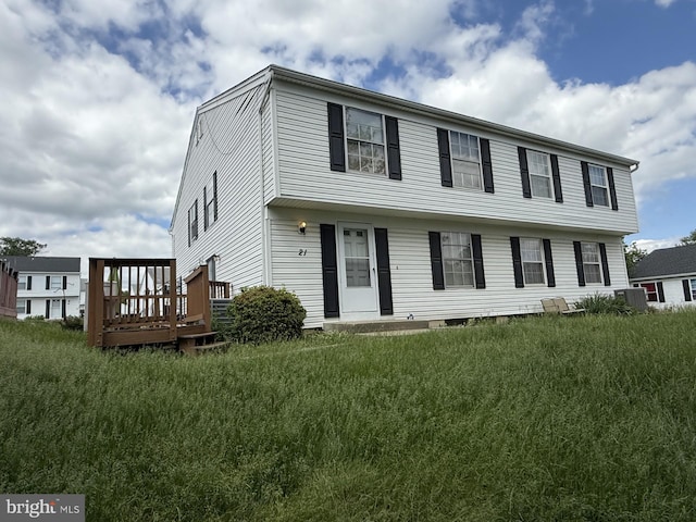 21 Ewing Dr Unit C, Reisterstown, MD 21136 - colonial home featuring a wooden deck and central AC unit