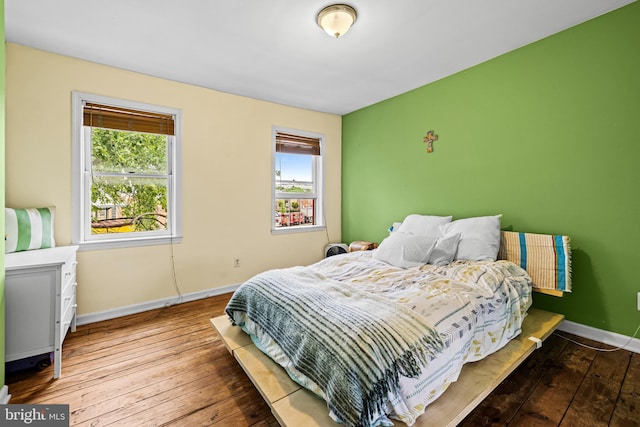907 Mchenry St, Baltimore, MD 21223 - bedroom with hardwood / wood-style flooring and baseboards