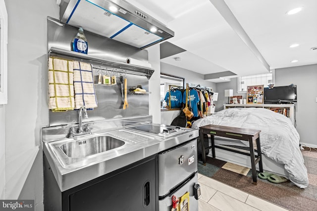 907 Mchenry St, Baltimore, MD 21223 - kitchen featuring dark cabinetry, a sink, stainless steel counters, recessed lighting, and electric cooktop