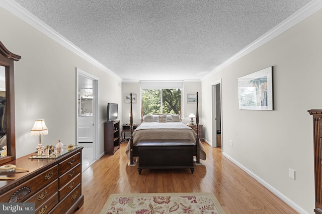 1515 S Arlington Ridge Rd Unit 402, Arlington, VA 22202 - bedroom featuring a textured ceiling, light wood-type flooring, ornamental molding, baseboards, and ensuite bathroom