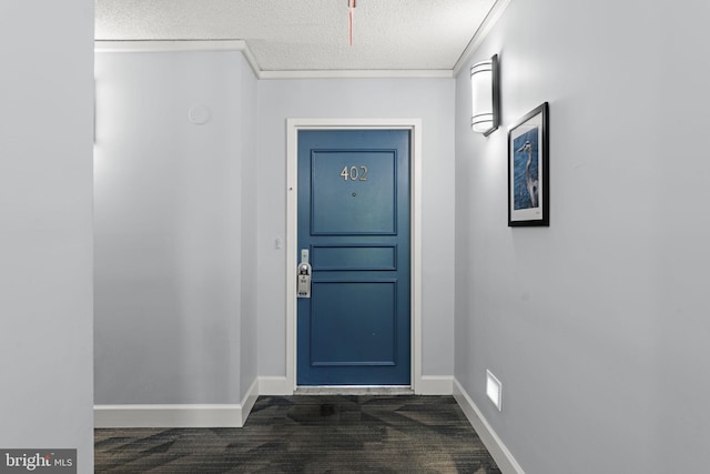 1515 S Arlington Ridge Rd Unit 402, Arlington, VA 22202 - entryway with a textured ceiling, baseboards, ornamental molding, and dark wood-style floors