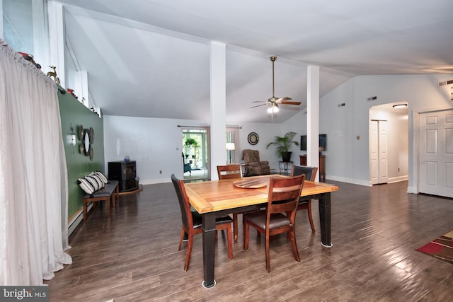 419 Breslin Rd, Joppa, MD 21085 - dining space featuring a wood stove, vaulted ceiling, wood finished floors, a ceiling fan, and a baseboard radiator