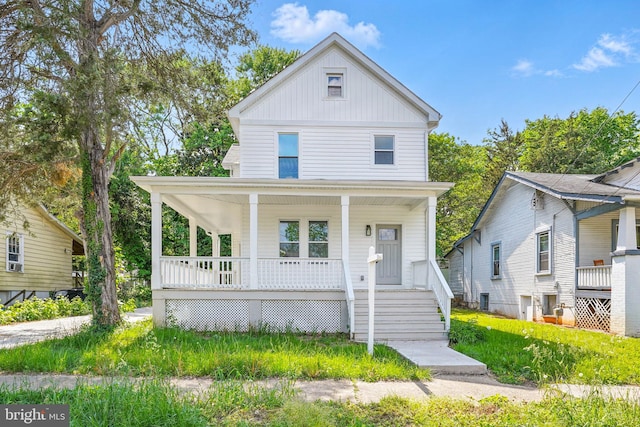 4016 35th St, Mount Rainier, MD 20712 - view of front of house with a porch and board and batten siding