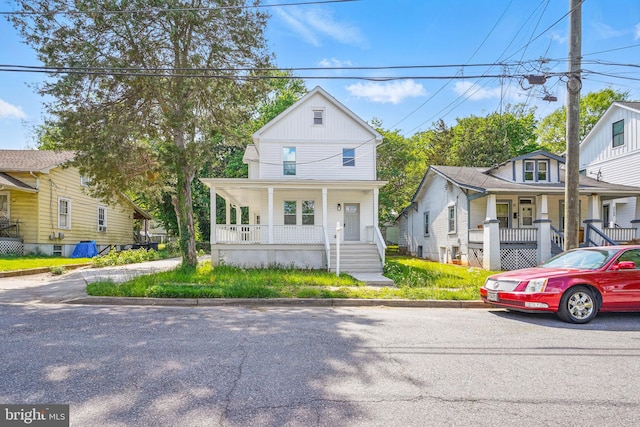 4016 35th St, Mount Rainier, MD 20712 - view of front of property with a porch and board and batten siding
